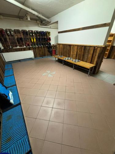 a room with a lot of shoes in a store at Karbergsuite Turrach in Turracher Hohe