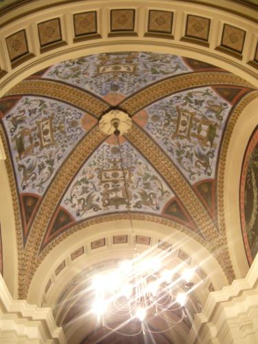 a ceiling with a chandelier in a building at Affittacamere Alla Stazione in Trieste