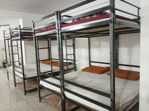 Postel nebo postele na pokoji v ubytování RL Dormitory