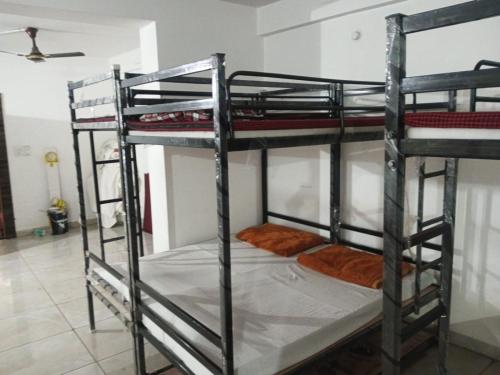 Postel nebo postele na pokoji v ubytování RL Dormitory