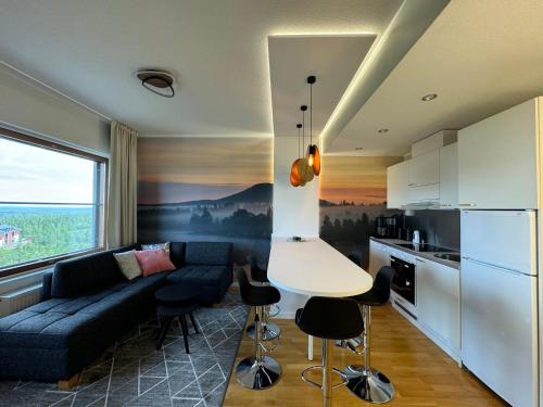 Кухня или мини-кухня в Uudistettu Ylläs Chalet 9504
