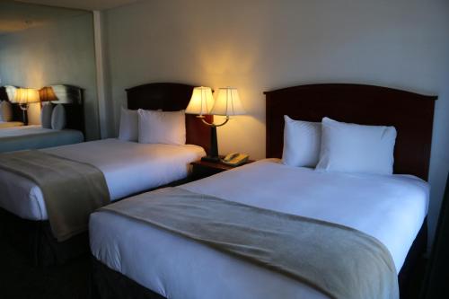 Letto o letti in una camera di Bluelake Inn @ Heavenly Village