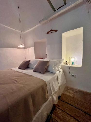 Una cama o camas en una habitación de casanu