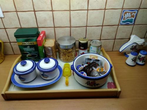 a tray with food and other items on a kitchen counter at Semi's House in Batsi