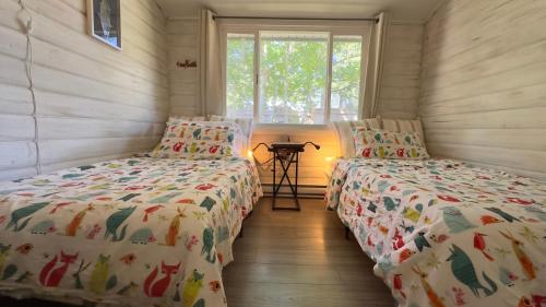 Ein Bett oder Betten in einem Zimmer der Unterkunft Lake Time Harrison