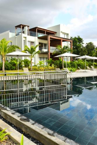Bazén v ubytování Beachfront Apartment Ocean Point nebo v jeho okolí
