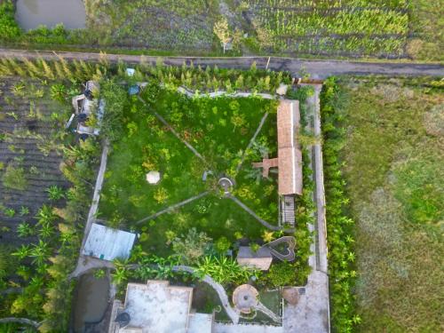 an overhead view of a garden with a cross in it at Ubuntu Kreative Village in Nairobi