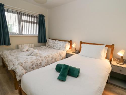 Postel nebo postele na pokoji v ubytování 14 Coedrath Park