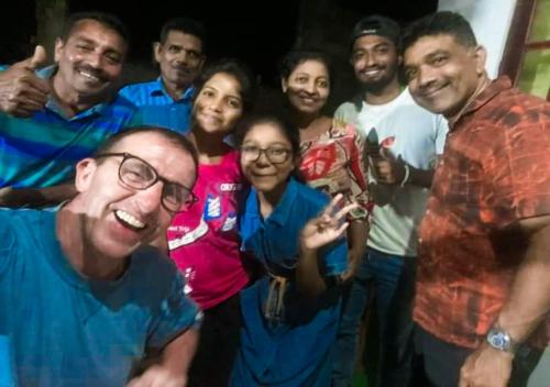 a group of people posing for a picture at Jm Resort in Dambulla