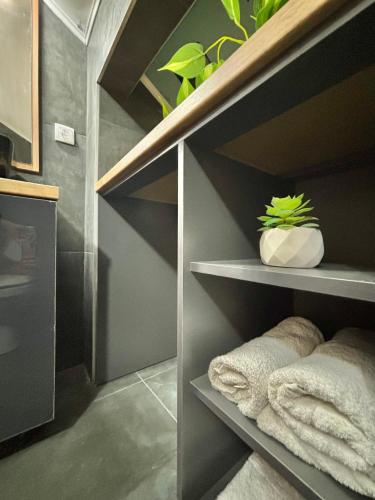 Kuchyň nebo kuchyňský kout v ubytování Promo Studio Apartment
