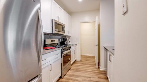 Dapur atau dapur kecil di Gorgeous Apt with Kitchen