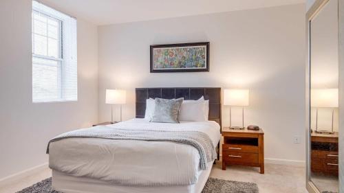 Katil atau katil-katil dalam bilik di Gorgeous Apt with Kitchen