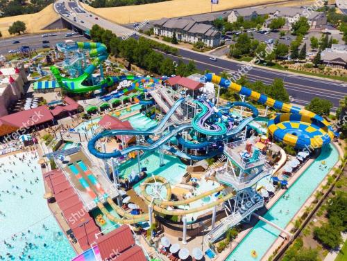 an aerial view of a water park at a resort at Elegant Luxury Villa Wheated Pool Outdoor Fun in Chandler