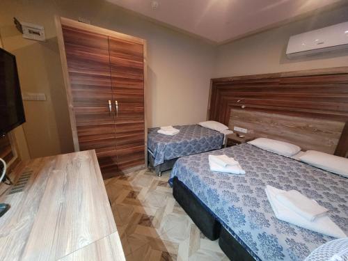 Selinus Beach Club Hotelにあるベッド