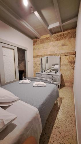 Ένα ή περισσότερα κρεβάτια σε δωμάτιο στο Symi_Villa_Ilias