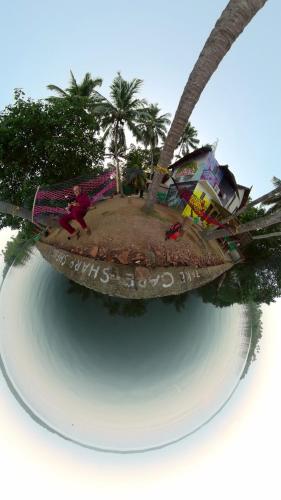 a rendering of a fake island with a man on it at SANTA MARIA HOSTEL MUNROE ISLAND in Munroe Island