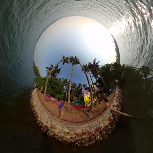 an aerial view of a tunnel with palm trees at SANTA MARIA HOSTEL MUNROE ISLAND in Munroe Island