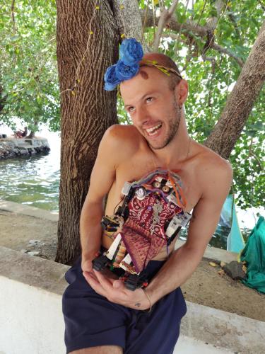 a man wearing a bathing suit with a bow on his head at SANTA MARIA HOSTEL MUNROE ISLAND in Munroe Island