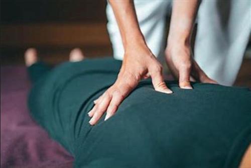 a person is sitting on top of a persons leg at Le Nid Cabailla in Coimères