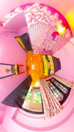 a large vase sitting on top of a machine at Santa Maria Hostel Kovalam in Kovalam