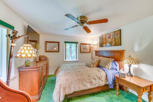 a bedroom with a bed and a desk and a ceiling fan at Pet-Friendly Lebanon Vacation Rental on 6 Acres! in Lebanon