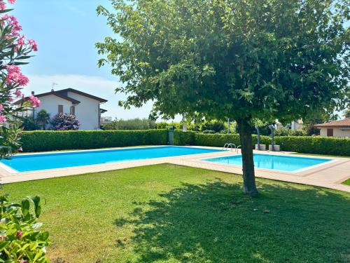Piscina en o cerca de Incanto Apartment Lazise - Pools e Garden