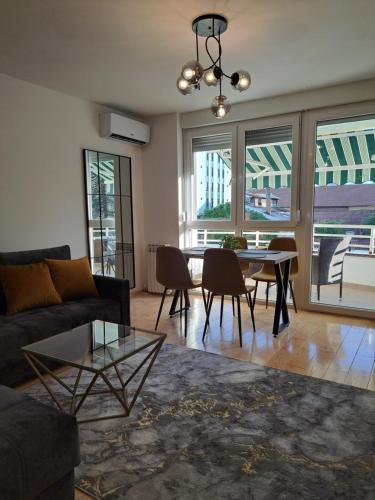 Posezení v ubytování Premier Apartment