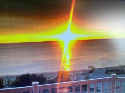 a blurry picture of a star in the water at Motel Belvedere in Saint-Siméon