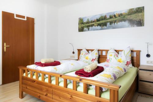 two beds with pillows on them in a bedroom at Appartement Schareckblick in Bad Gastein
