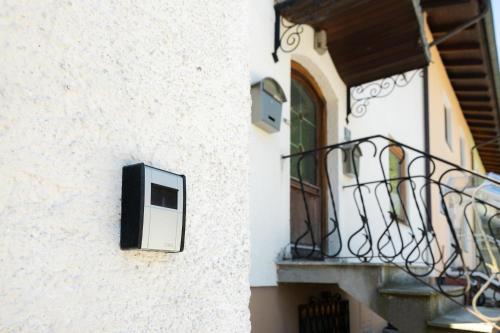 a balcony of a building with a television on it at Appartement Schareckblick in Bad Gastein