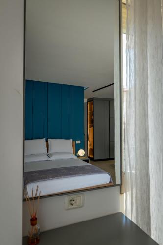 Cama o camas de una habitación en Domi Luxury beach view apartments in Saranda