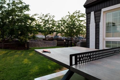 a bench with a toy remote control sitting on top of it at Xhale Resort & Spa - ADULTS ONLY RESORT in Idaho Falls