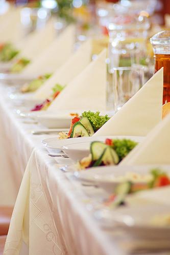 a row of plates of food on a table at Zajazd Maj in Bolesław