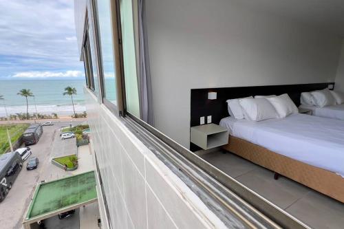 Postel nebo postele na pokoji v ubytování Hotel Ritz Suítes | Flat632 | Quarto com Vista mar