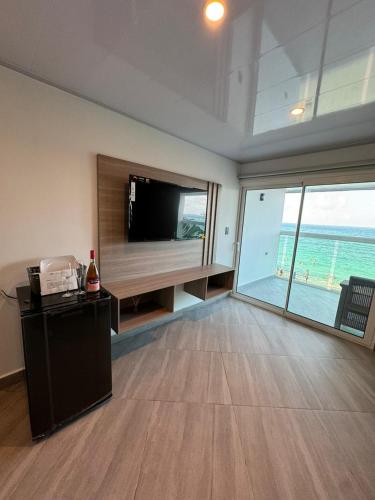 TV a/nebo společenská místnost v ubytování Hotel Molino de Viento
