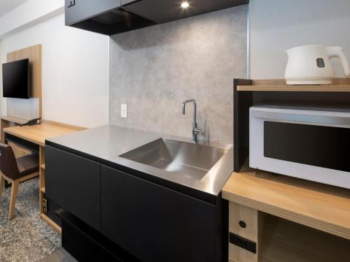 Kuchyň nebo kuchyňský kout v ubytování HOTEL MYSTAYS Iidabashi