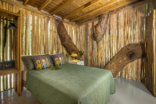 Postel nebo postele na pokoji v ubytování El Encuentro Surf Lodge