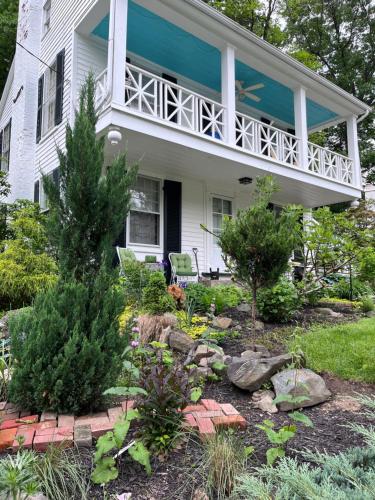 a house with a garden in front of it at House on the Gwynns Falls in Baltimore