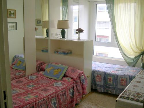 Un pat sau paturi într-o cameră la Chambres d'hôtes Issy-Paris