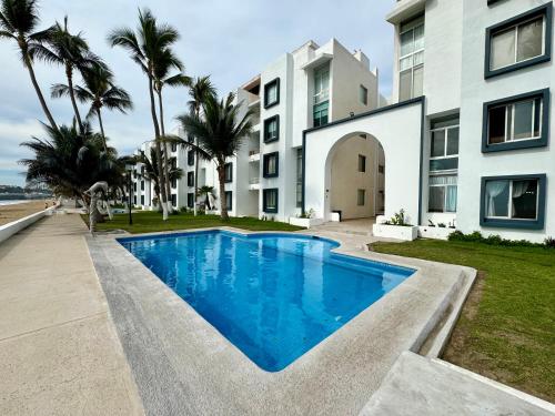 Kolam renang di atau dekat dengan Bonito departamento a pie de playa en Manzanillo