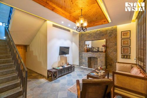 Χώρος καθιστικού στο StayVista at Sylvana Villas with Lawn, BBQ and Jacuzzi