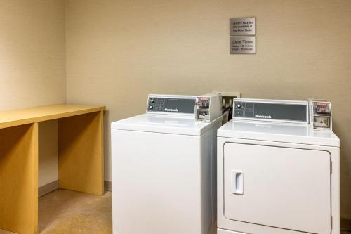 two machines sitting next to each other in a room at Fairfield Inn & Suites by Marriott Smithfield in Smithfield