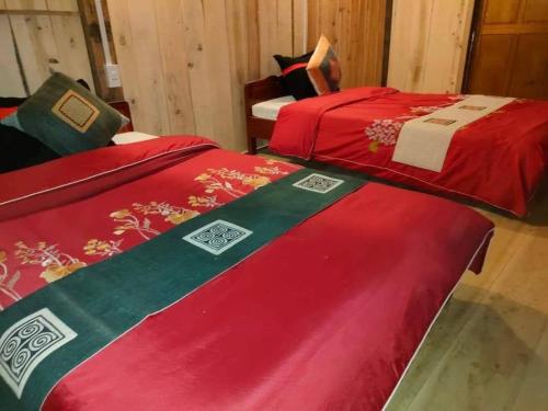 Postel nebo postele na pokoji v ubytování Dồn Dao Homestay
