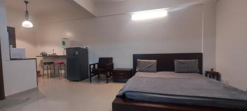 Kuchyň nebo kuchyňský kout v ubytování Tranquil Serviced Apartments