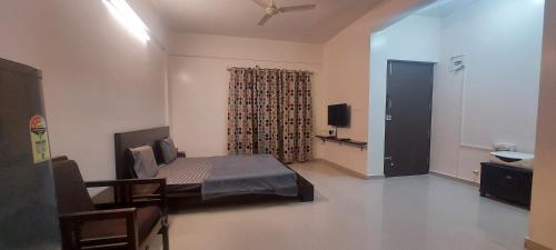 TV a/nebo společenská místnost v ubytování Tranquil Serviced Apartments