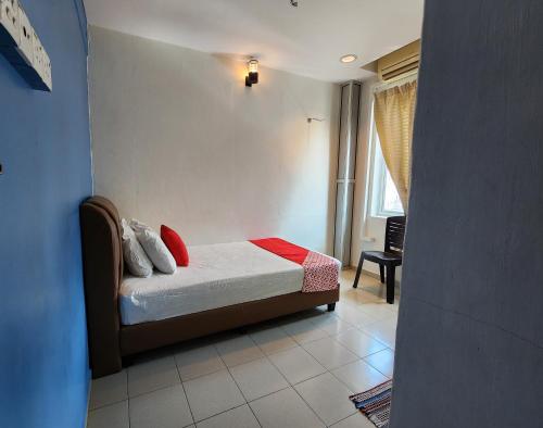 Postel nebo postele na pokoji v ubytování Hotel O Ban Cheong