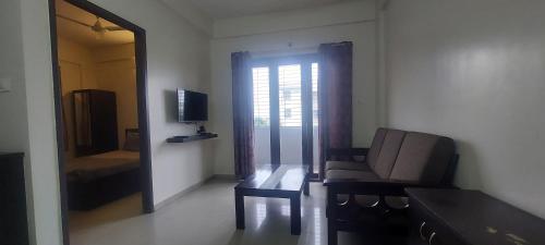 TV a/nebo společenská místnost v ubytování Tranquil Serviced Apartments