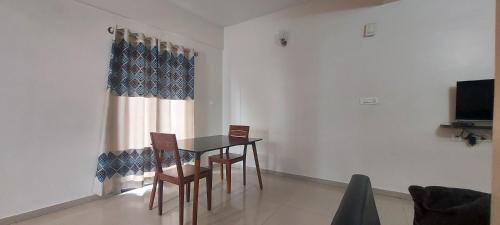 TV a/nebo společenská místnost v ubytování Tranquil Serviced Apartments