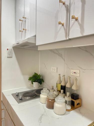 Una cocina o zona de cocina en CD Staycation - Unit 5 at Trees Residences