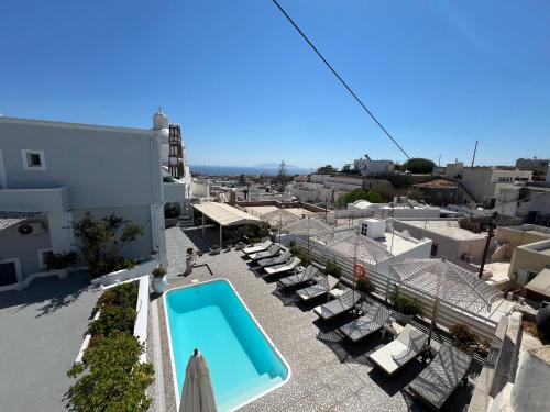 a view of a swimming pool on a balcony of a building at Villa Pavlina in Karterados